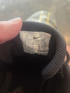 Nike Black Athletic Shoes with Gold Accents